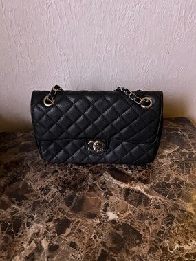 CHANEL Black Quilted Leather Shoulder Bag with Gold Hardware